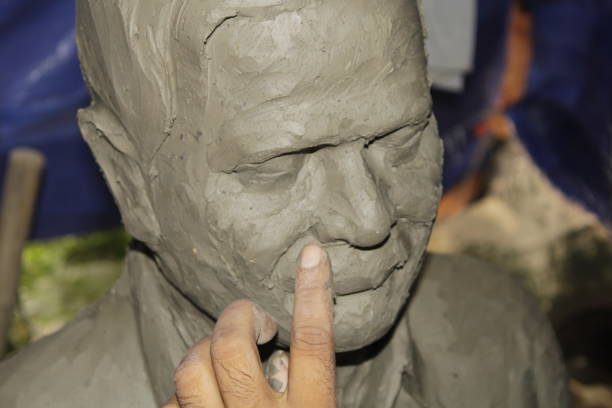Artist Sculpting A Beautiful Half bust Clay Sculpture